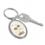 Egg Shaped Keychain With Embossed Border Combinig With Keys