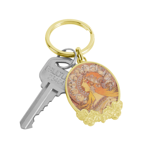 Oval Shaped Metal Keychain With Decorative Border With Keys