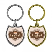 Professional Plating Of Shield Shaped Keychain With Embossed Border