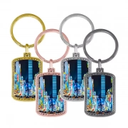 Rounded Rectangular Keychain With Embossed Border In Different Colors