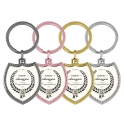 Shield Shaped Keychain With Embossed Border In Different Colors