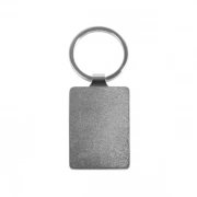 The Back Side Of Rectangular Keychain With Embossed Border