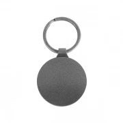 The Back Side Of Round Keychain With Embossed Border