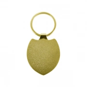 The Back Side Of Shield Shaped Keychain With Embossed Border