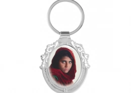 The Front Side Of Custom Oval Shaped Keychain With Hollow Border