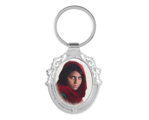 The Front Side Of Custom Oval Shaped Keychain With Hollow Border