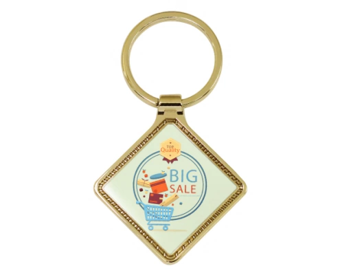 The Front Side Of Diamond Shaped Keychain With Embossed Border