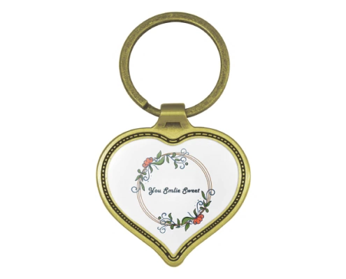 The Front Side Of Heart Shaped Keychain With Embossed Border