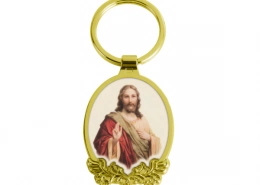 The Front Side Of Oval Shaped Metal Keychain With Decorative Border