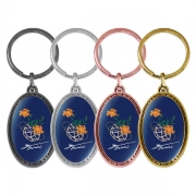 Vertically Oriented Oval Keychain With Embossed Border In Different Colors